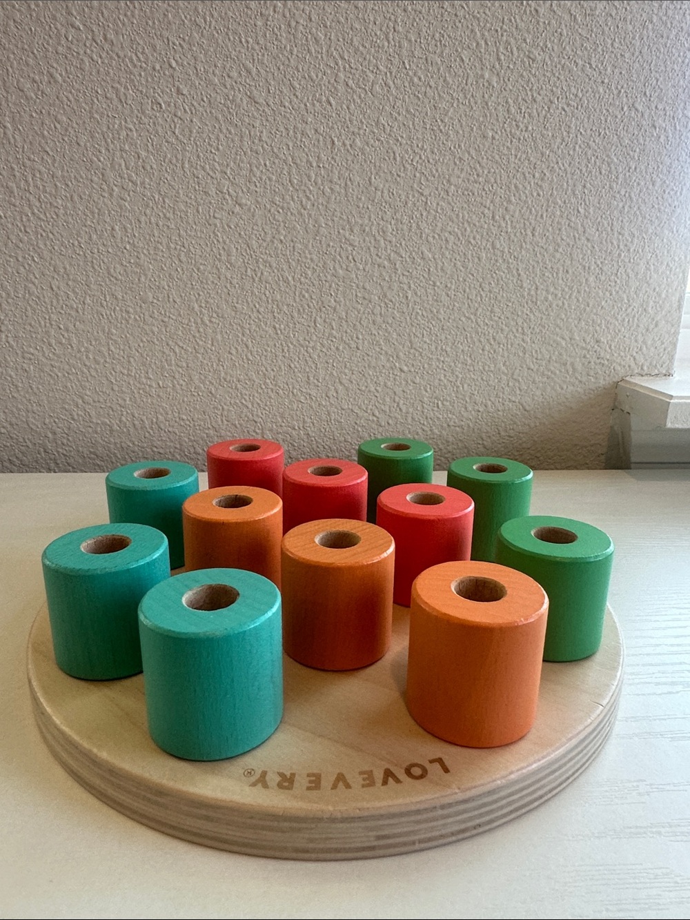 Wooden Color Peg Stacking Game - Green, Orange, Red, Teal